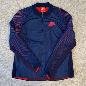 Blue and red Nike jacket